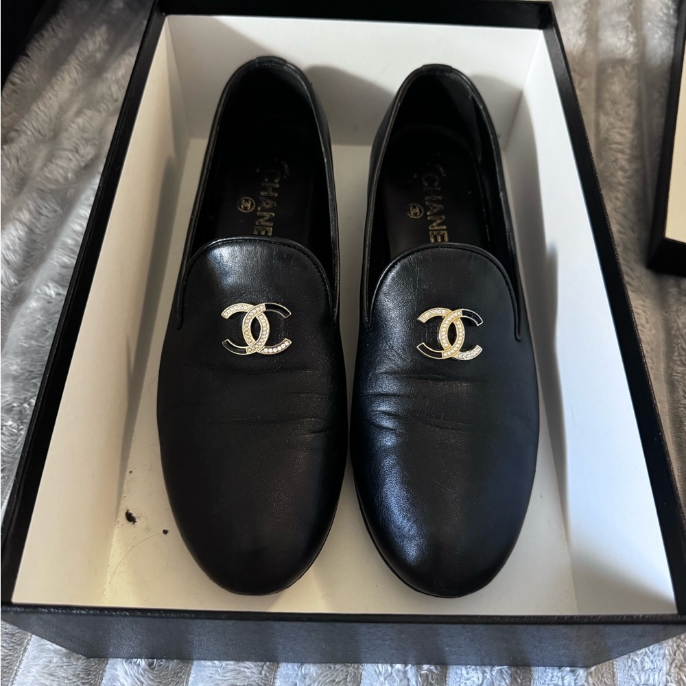 CHANEL Black Loafers with Gold Emblem